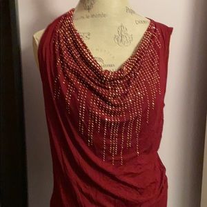 Festive burgundy sleeveless top with sparkle.